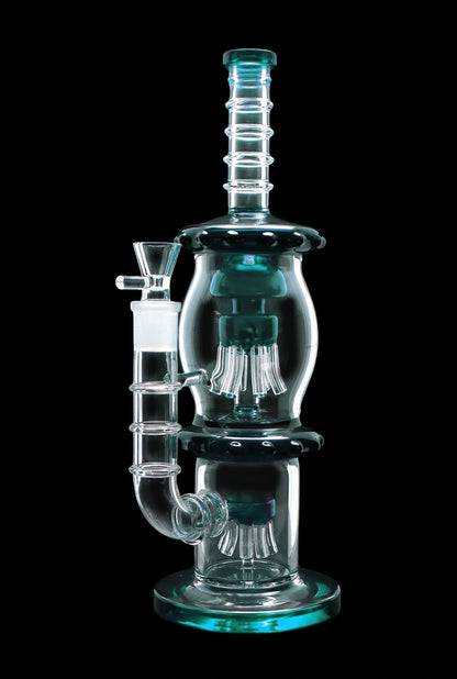 A studio shot of the 13.5-inch Smoke Cartel Straight Tube with Dual Octopus Perc, showing its clear glass construction and intricate perc design.