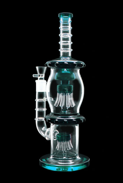 Front view of the Smoke Cartel Straight Tube w/ Dual Octopus Perc, showcasing the intricate perc design within the clear glass tube.