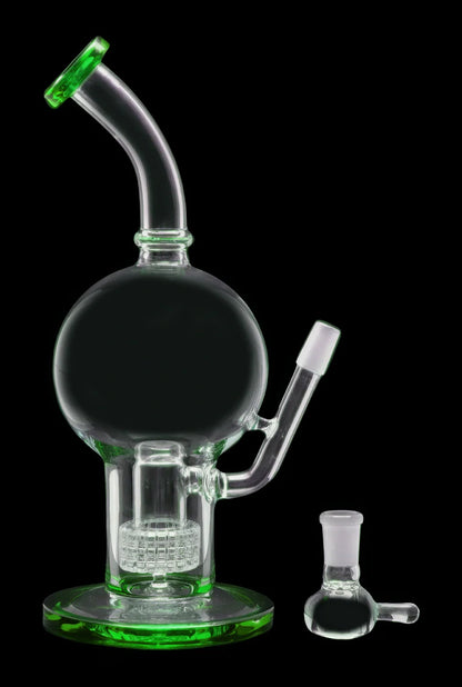 Green glass bubbler water pipe and separate bowl piece on a black background.