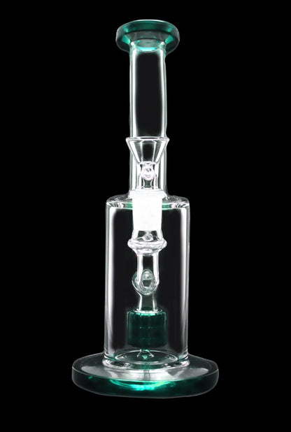 Clear glass water pipe (bong) with green accents, studio shot on black background.