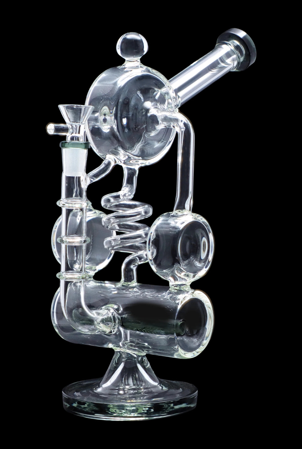 Clear glass water pipe (rig) with complex bubbler and percolator system, isolated on a black background.