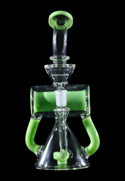 Green and clear glass water pipe (rig) with intricate design.