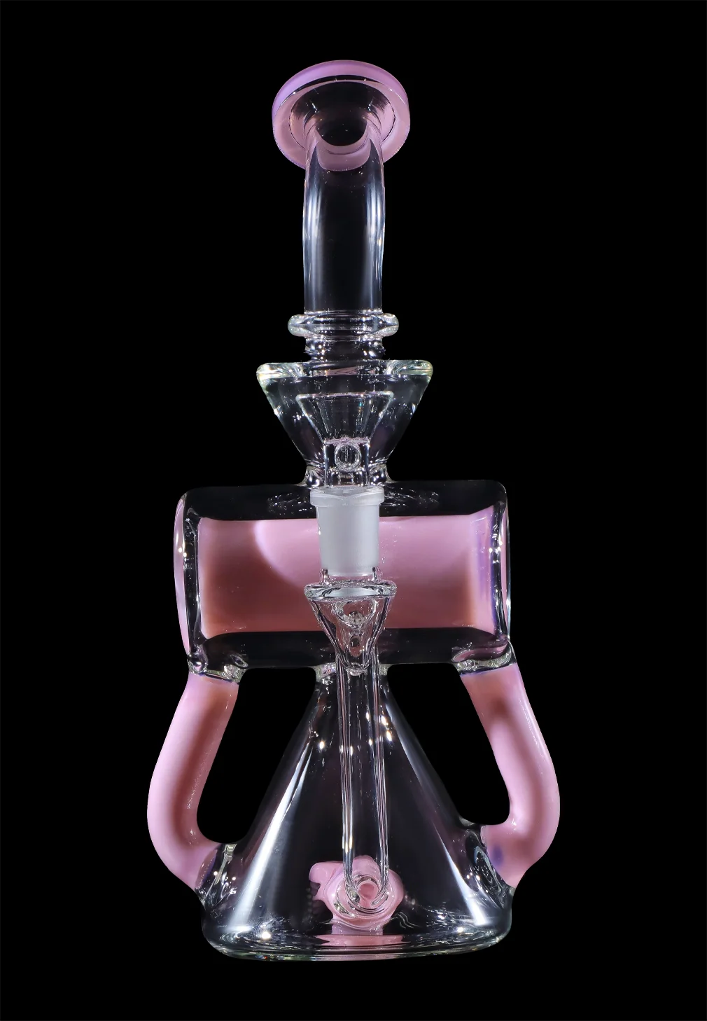 Pink glass water pipe (rig) with intricate design against a black background.