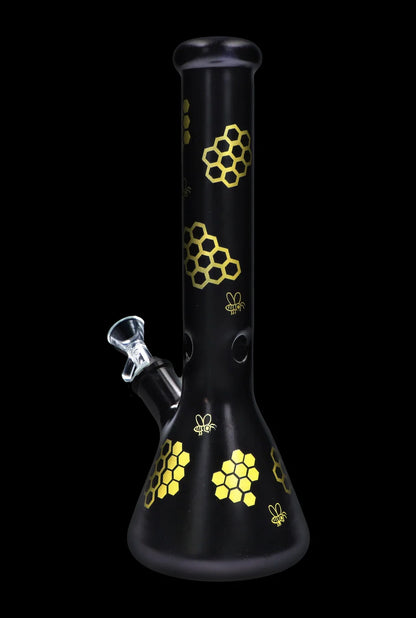 Black glass bong with gold honeycomb and bee designs.