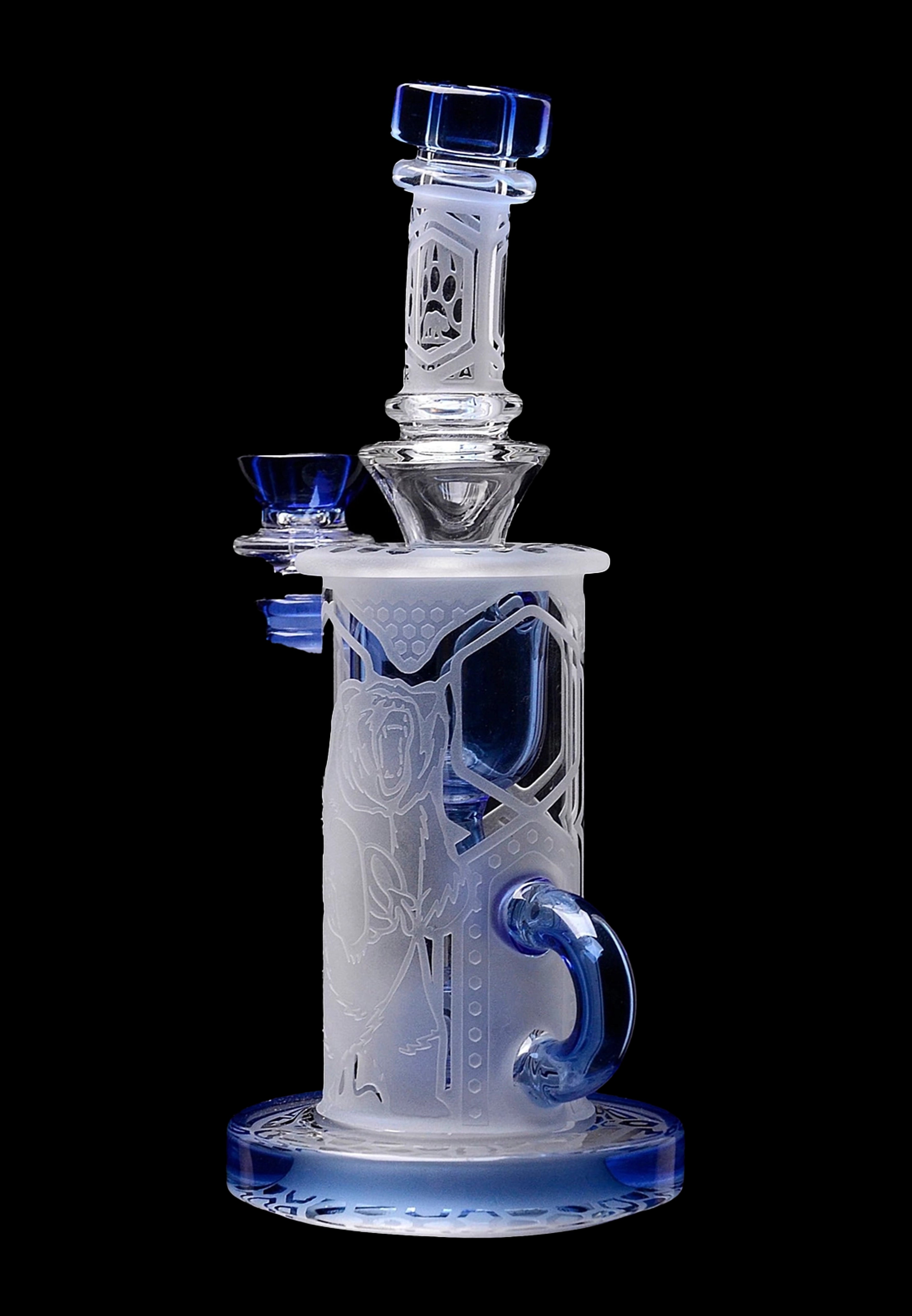 Frosted glass water pipe (bong) with blue accents and intricate geometric designs, isolated on a black background.