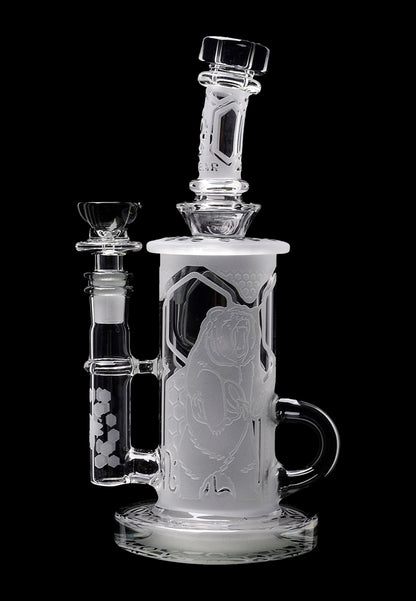 Frosted glass water pipe (bong) with intricate sculpted figures, featuring a separate downstem and bowl.