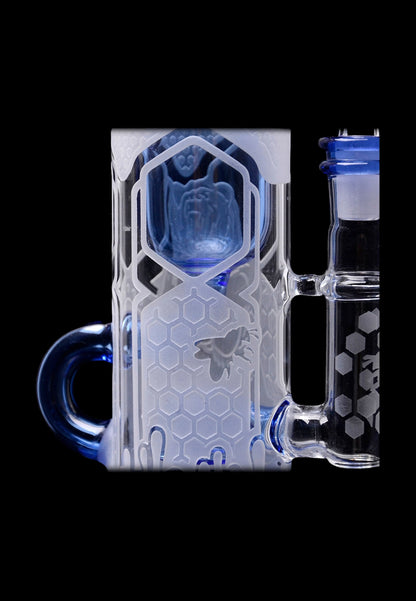 Clear glass water pipe with blue accents, honeycomb pattern, and sculpted bee detail.