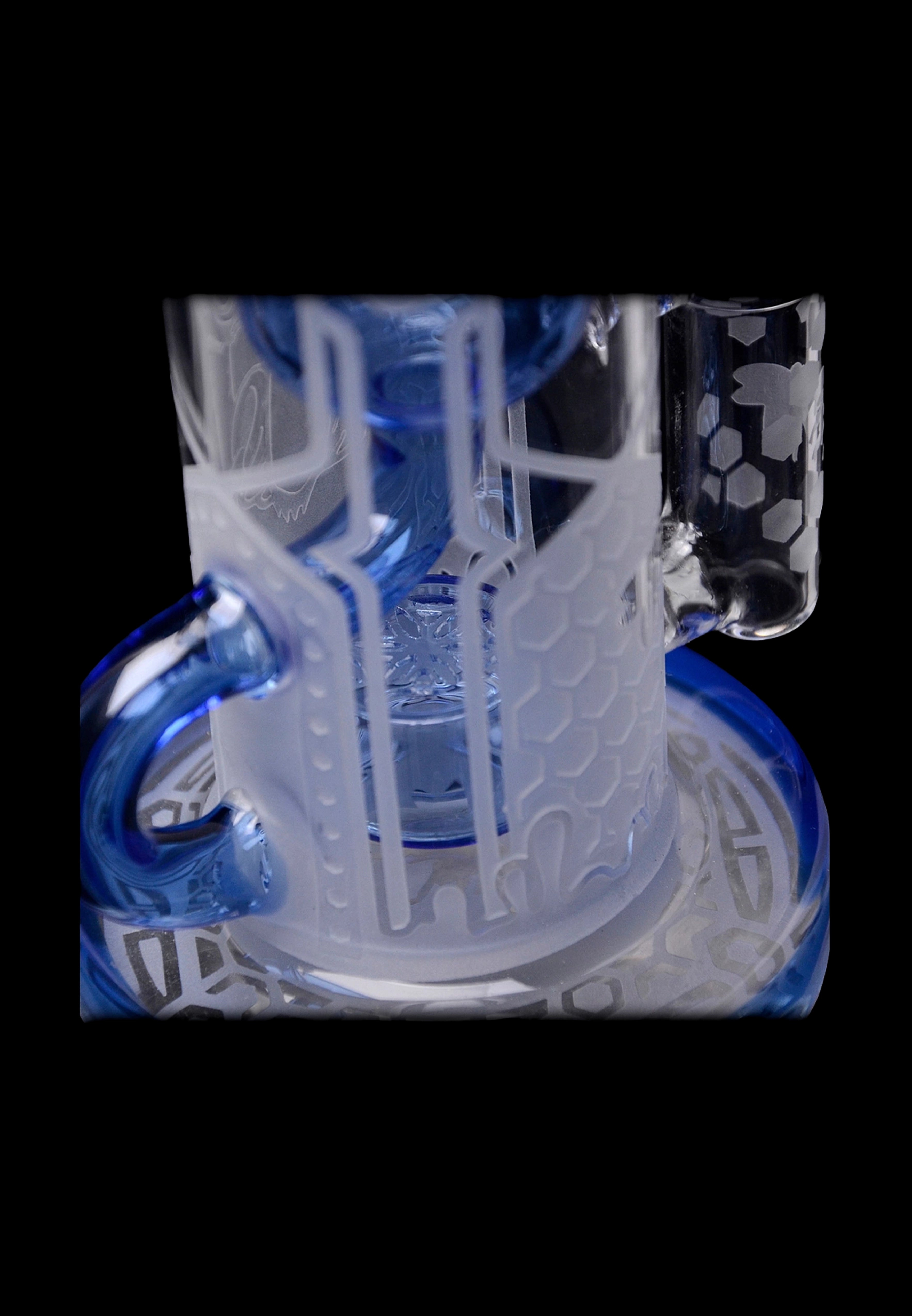 Blue glass water pipe with intricate etched designs.