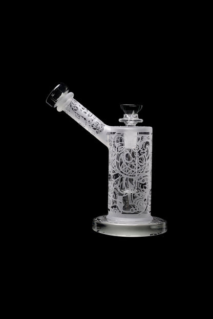 Frosted glass water pipe with intricate floral designs, studio shot on black background.