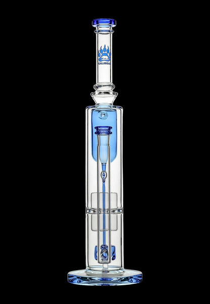 Blue glass water pipe (bong) with intricate percolators, isolated on a black background.