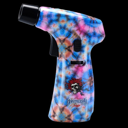 Close-up side view of the Grateful Dead Power Torch with a blue, pink, and orange kaleidoscope tie-dye pattern and visible skull graphic on a black background.