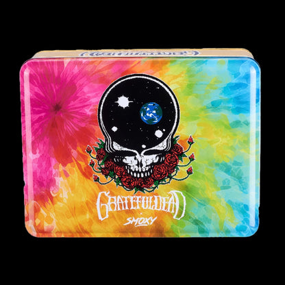 Top-down view of a colorful tie-dye tin featuring the Grateful Dead Vulcan Torch skull logo surrounded by red roses.
