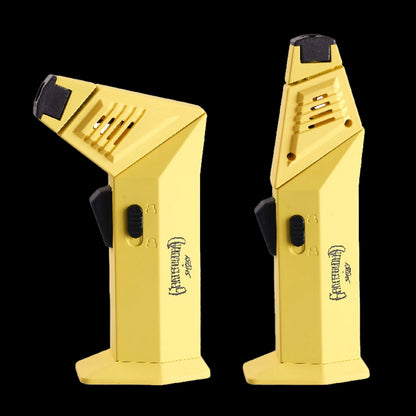 Close-up front and angled views of two yellow Grateful Dead Flex Torch lighters against a black background, showing the angled nozzles, vents, and side ignition switches.