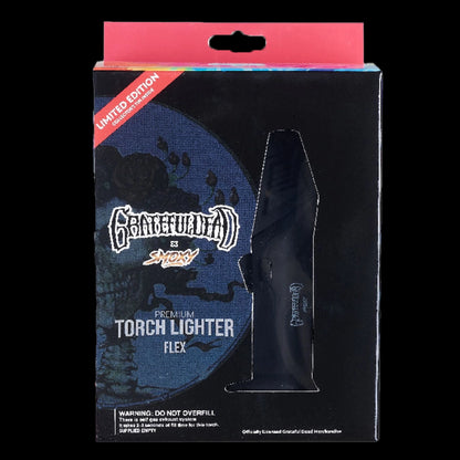 Front view of the Grateful Dead Flex Torch packaging showing a black torch silhouette against blue skull artwork.