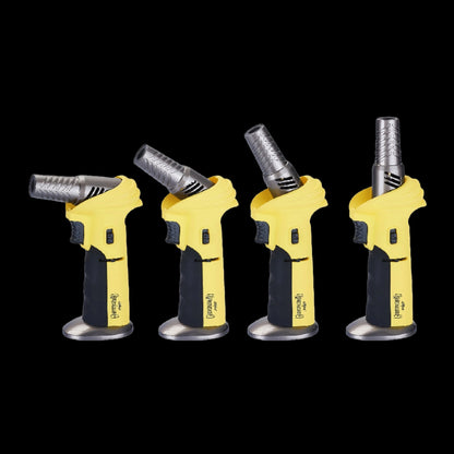 Row of four yellow Grateful Dead Alternator Torch lighters on a black background showing progressive nozzle angles.