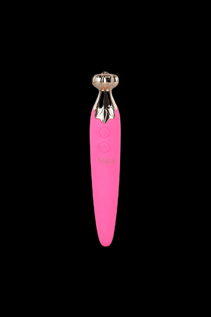 Pink cannabis oil applicator with gold accents.