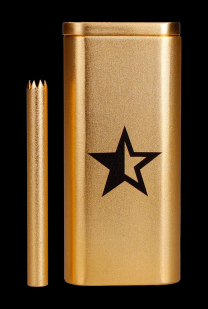 Gold-toned cannabis smoking tube with a black star logo and accompanying metal pick.