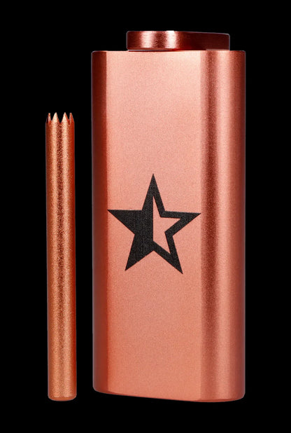 Copper-colored one-hitter pipe with a black star logo and a detachable mouthpiece.