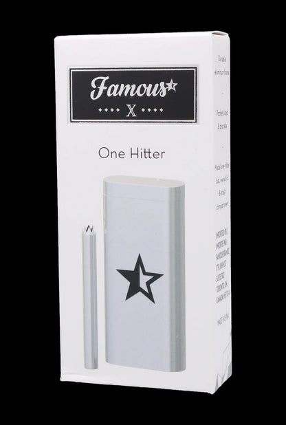 White retail box for a “Famous” brand one-hitter smoking device, featuring a black star logo and product details.