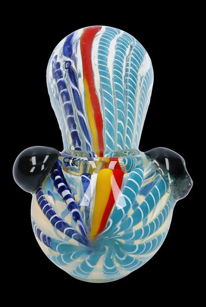 Hand-blown glass bubbler with blue and white swirling patterns and red accents.