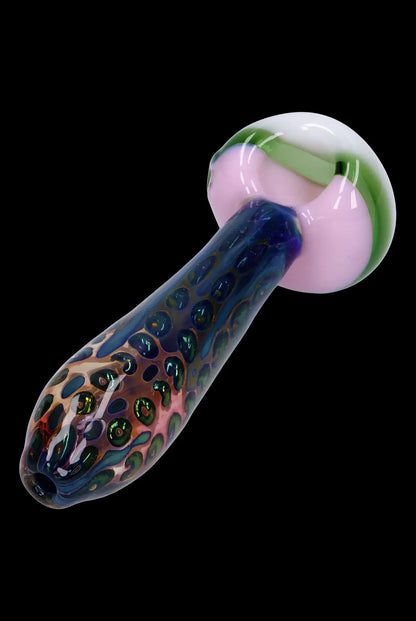 Handblown glass pipe with colorful, speckled pattern.