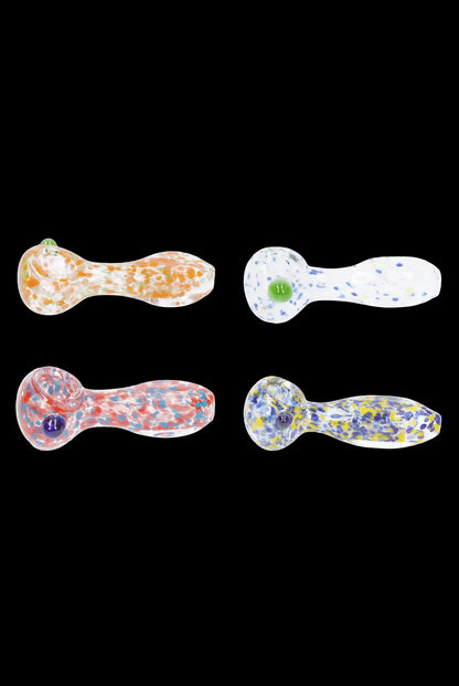 Four colorful glass smoking pipes against a black background.