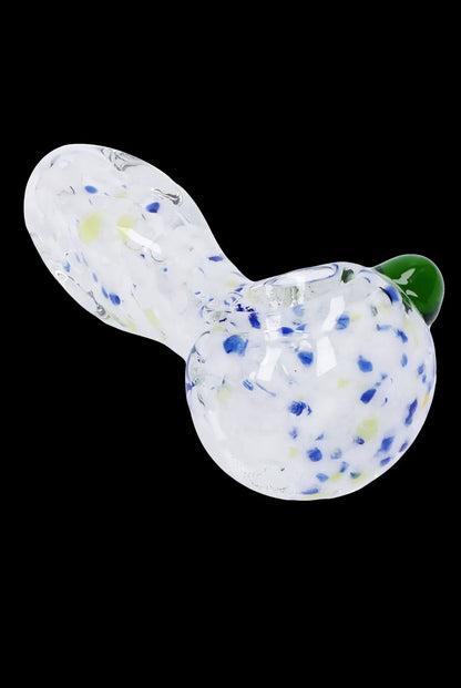 White and blue speckled glass pipe with green mouthpiece.