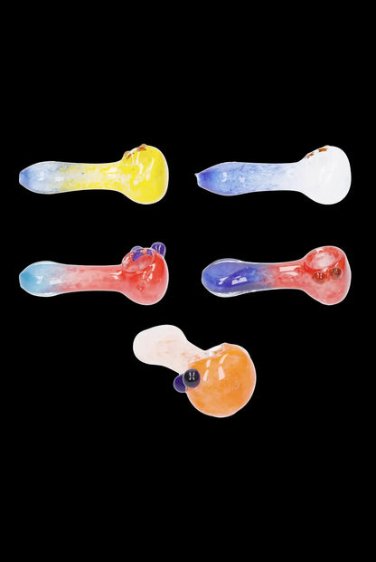 Assorted glass smoking pipes in vibrant colors against a black background.