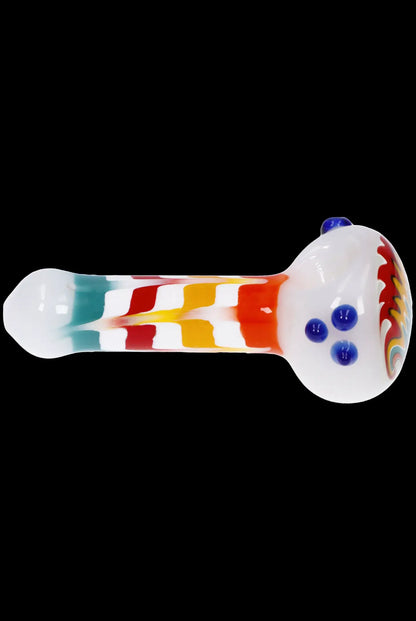 Colorful glass smoking pipe on a black background.
