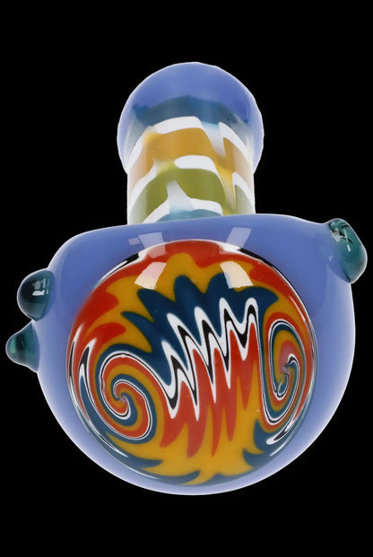 Colorful glass bubbler pipe with flame-like swirls.