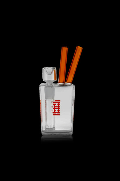 Clear glass bubbler with orange accents and red branding, isolated on a black background.