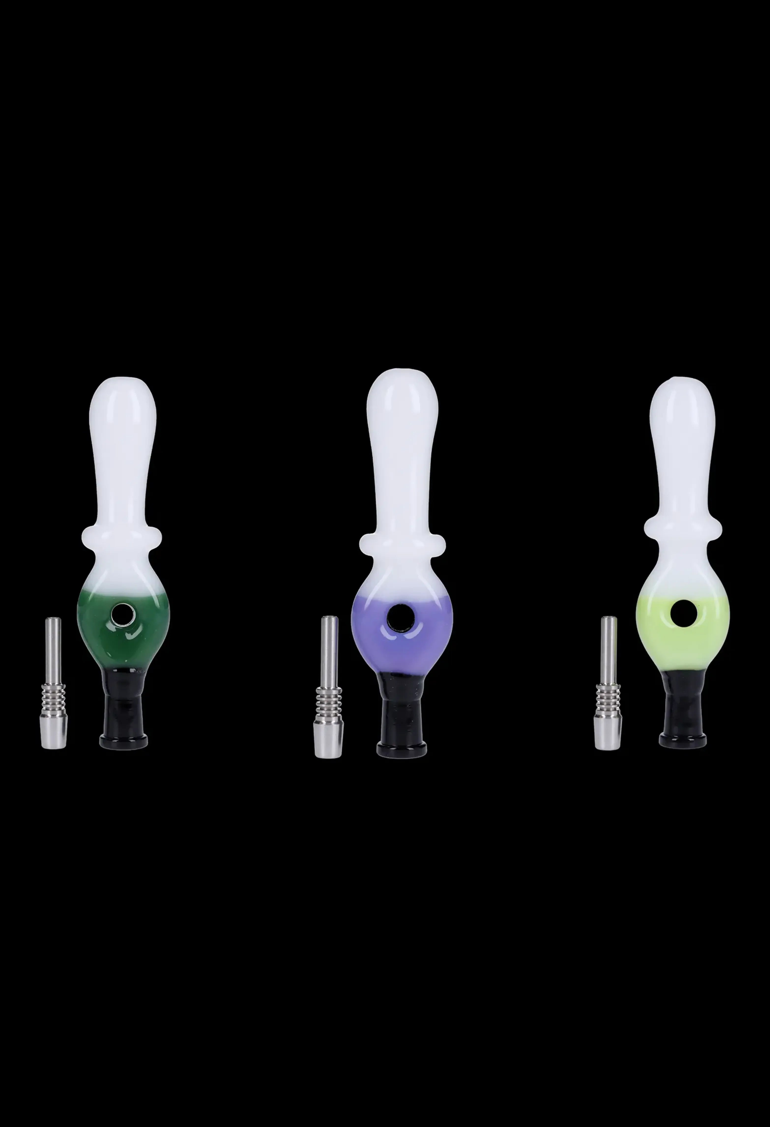Three colorful glass oil rigs with quartz inserts against a black background.