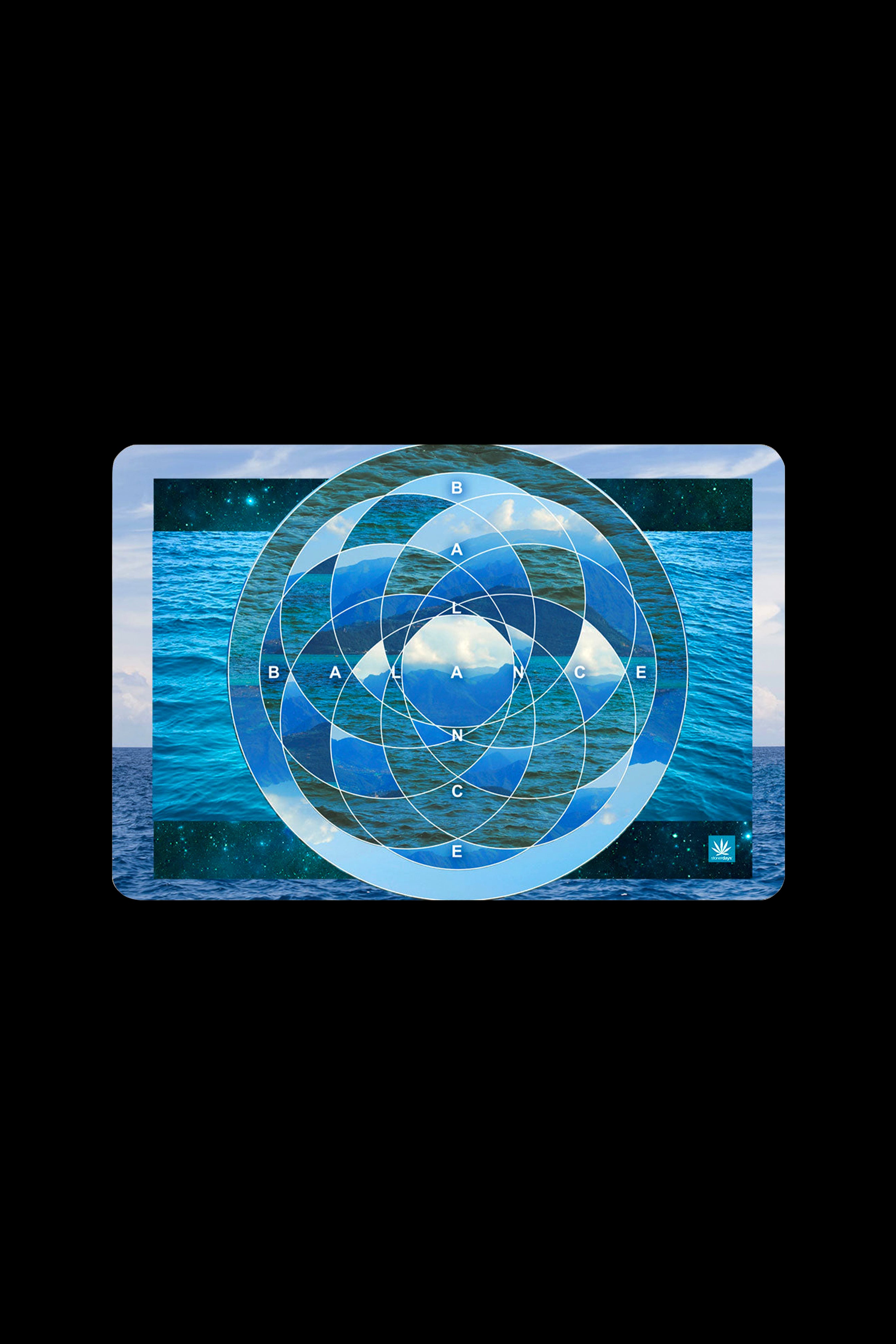 A rectangular cannabis rolling tray featuring an oceanic scene with concentric blue and white target-like circles and the word “BALANCE” spelled out within the design.