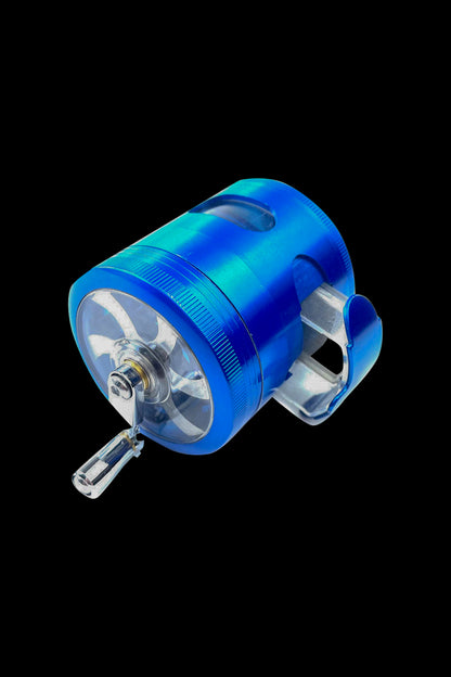 Blue cannabis grinder with a transparent body and metal teeth.