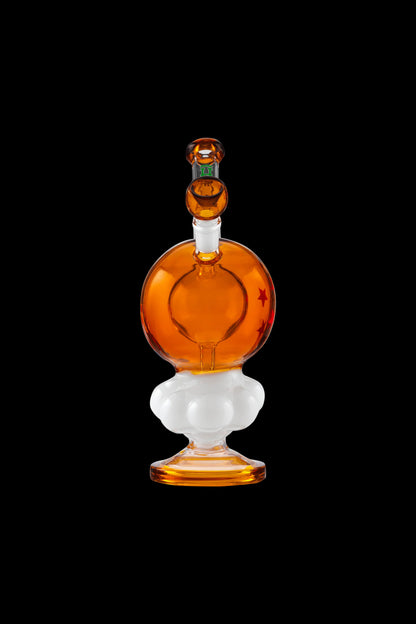 Amber glass water pipe with white accents, studio shot.
