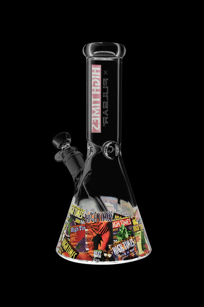 A glass bong with “High Times” magazine collage design and black accents, isolated on a black background.