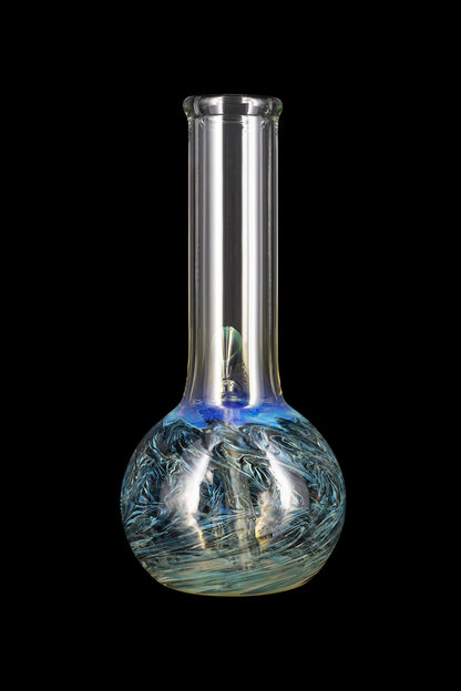 Glass water pipe with blue and green swirling patterns against a black background.
