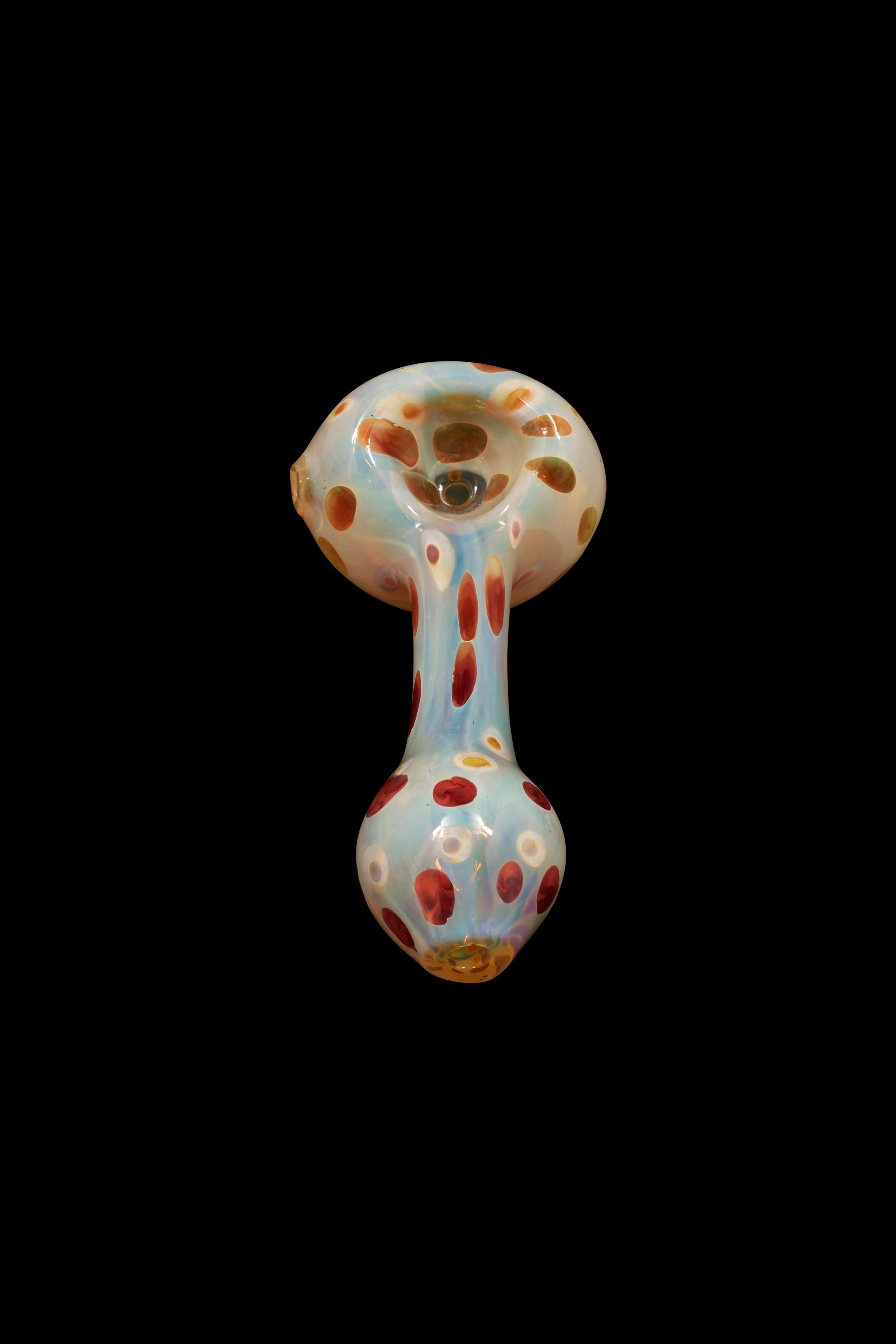 Glass pipe with colorful speckled pattern on black background.