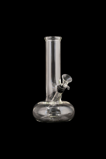 Clear glass water pipe (bong) against a black background.