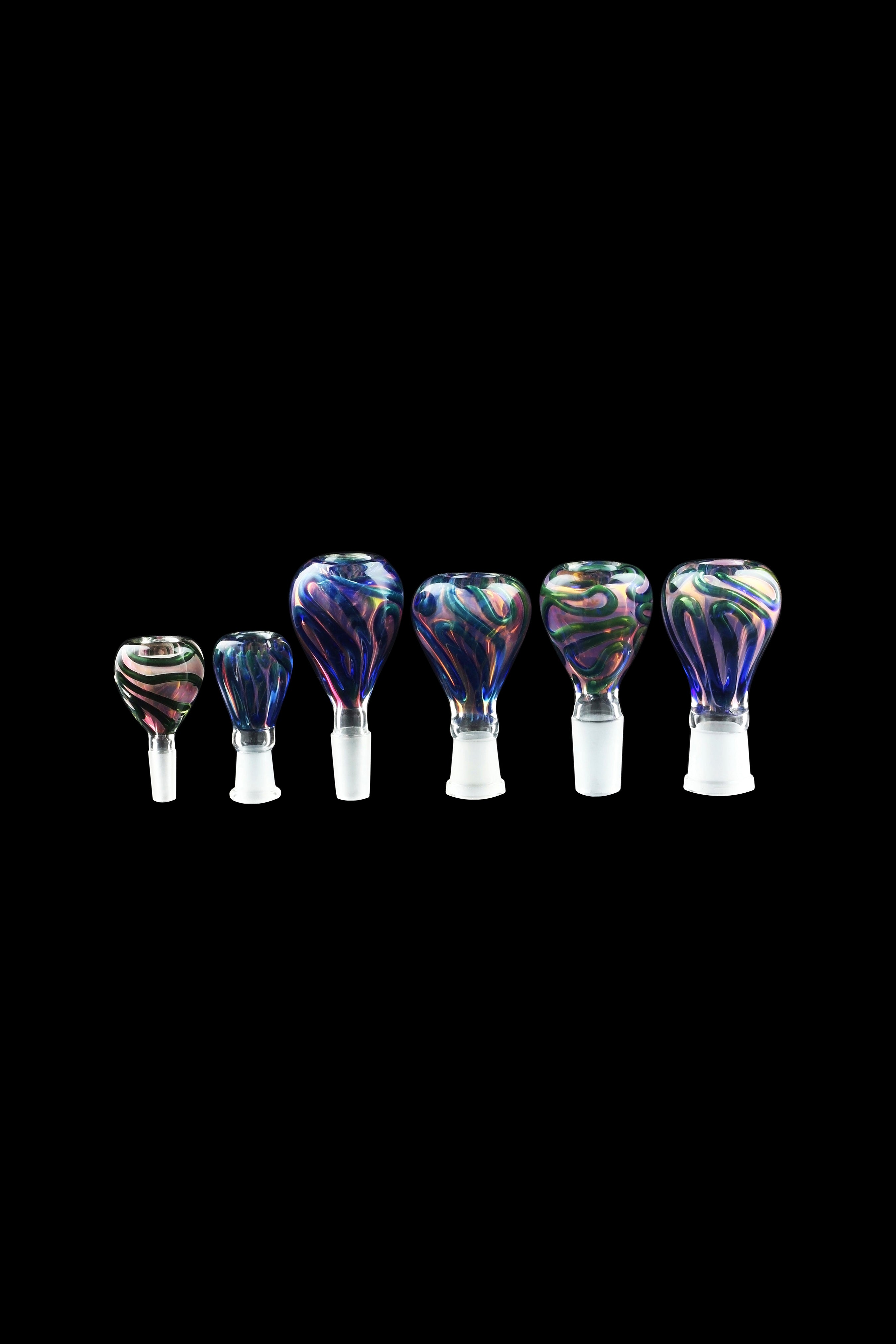 A row of colorful glass smoking bowls with marbled patterns against a black background.