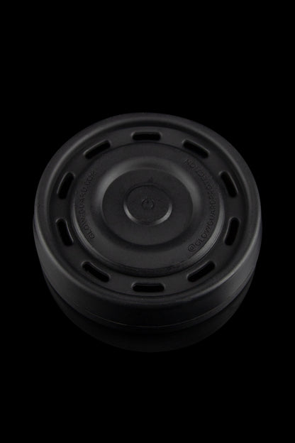 Black silicone container for cannabis concentrates.