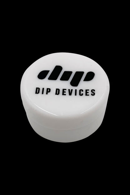 Top-down close-up of a white Dip Devices Silicone Container lid showing the black logo and bold "DIP DEVICES" text.