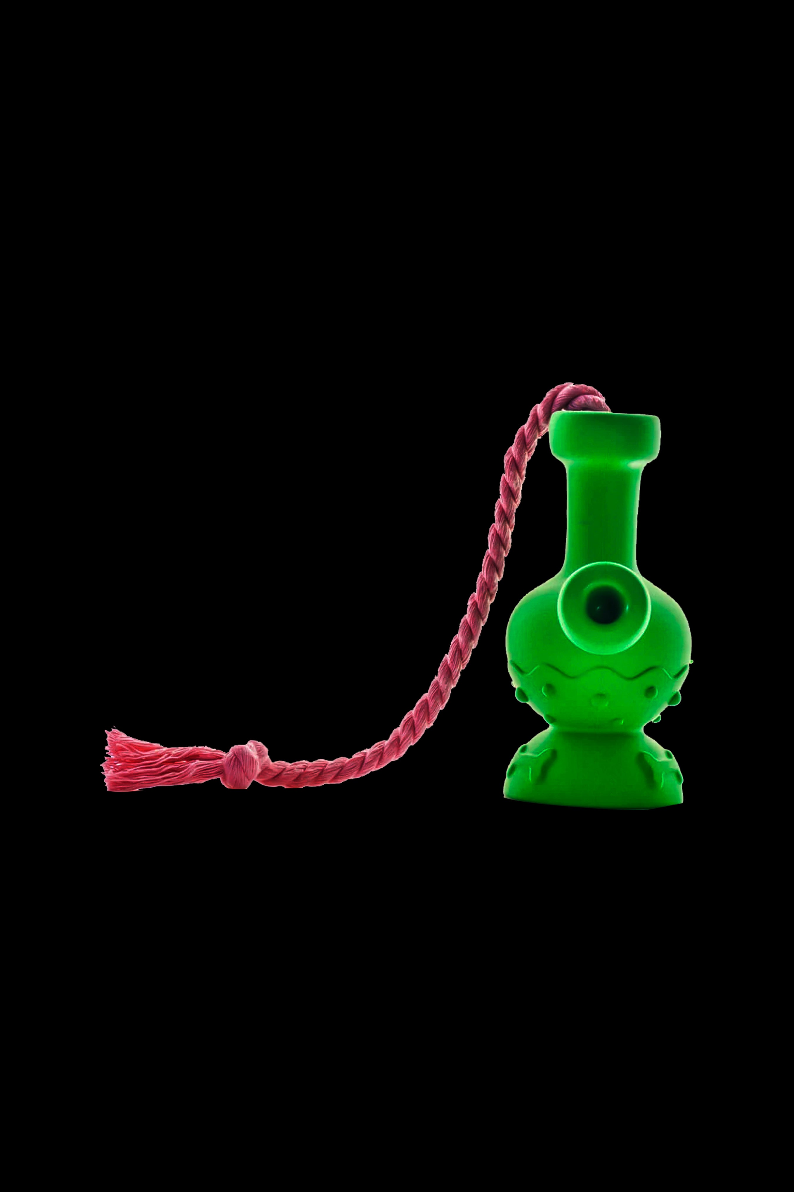 Green glass bubbler with a red cord attached.