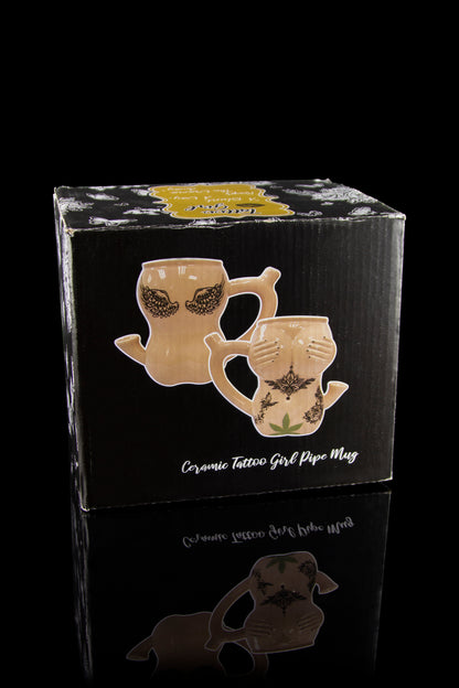 Cardboard box for a "Ceramic Tattoo Girl Pipe Mug" with images of the ceramic mug featuring a tattooed woman design.