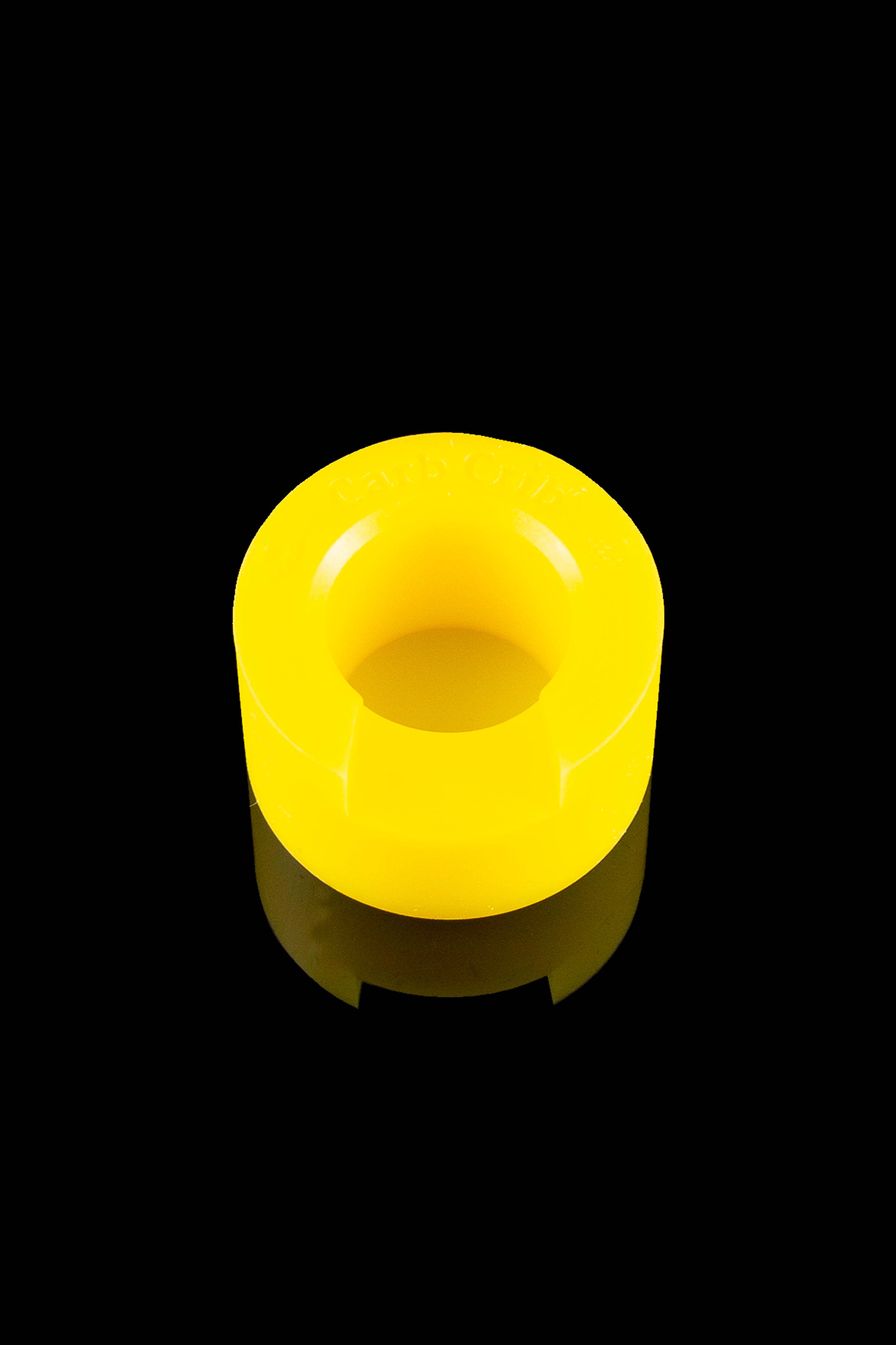 Yellow silicone cannabis concentrate container.