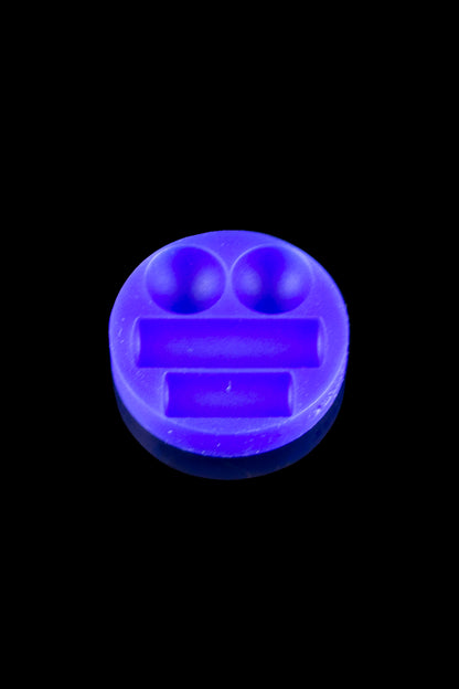 Glow-in-the-dark cannabis pipe screen.