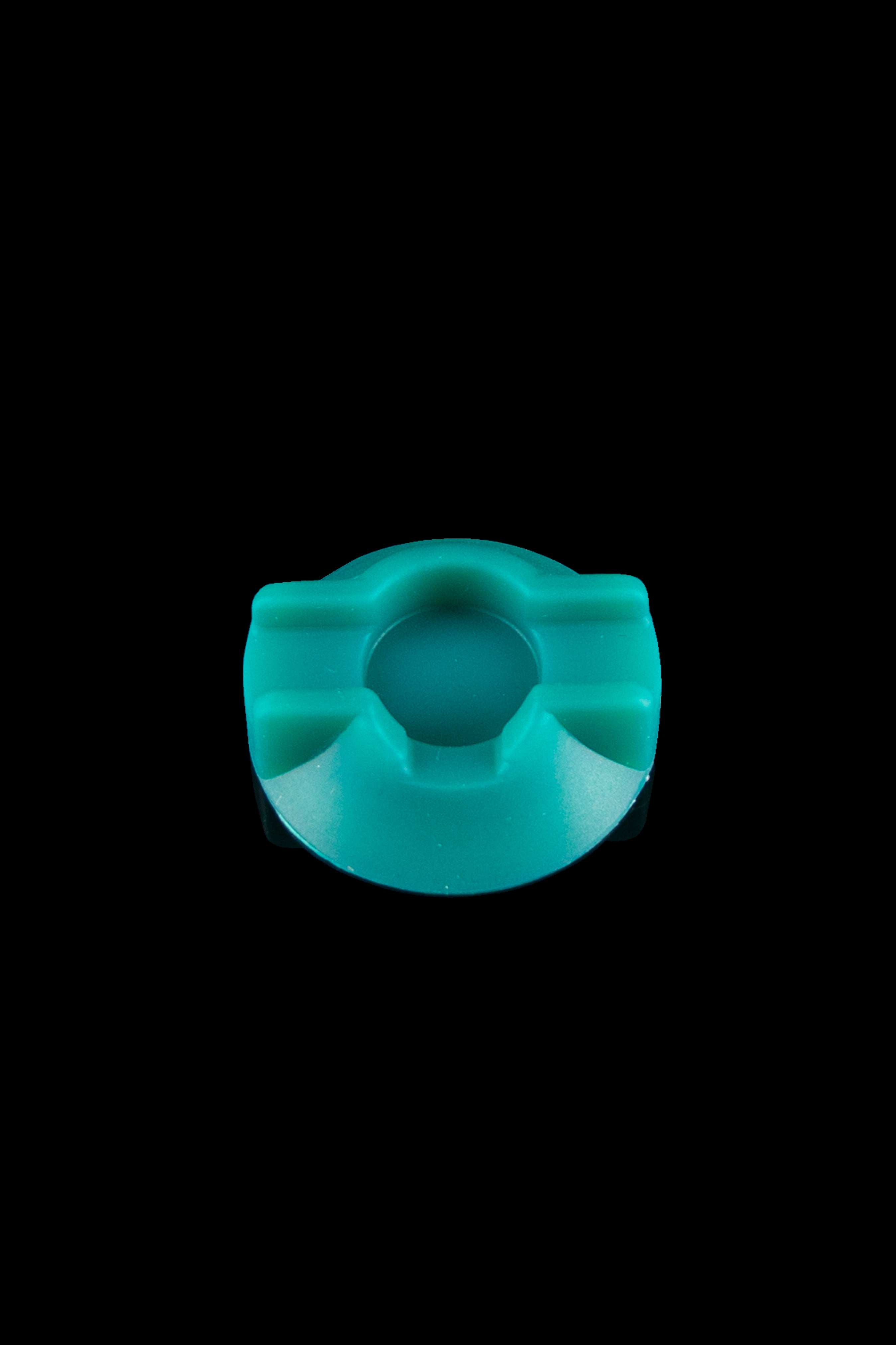 Turquoise cannabis bowl piece isolated on a black background.