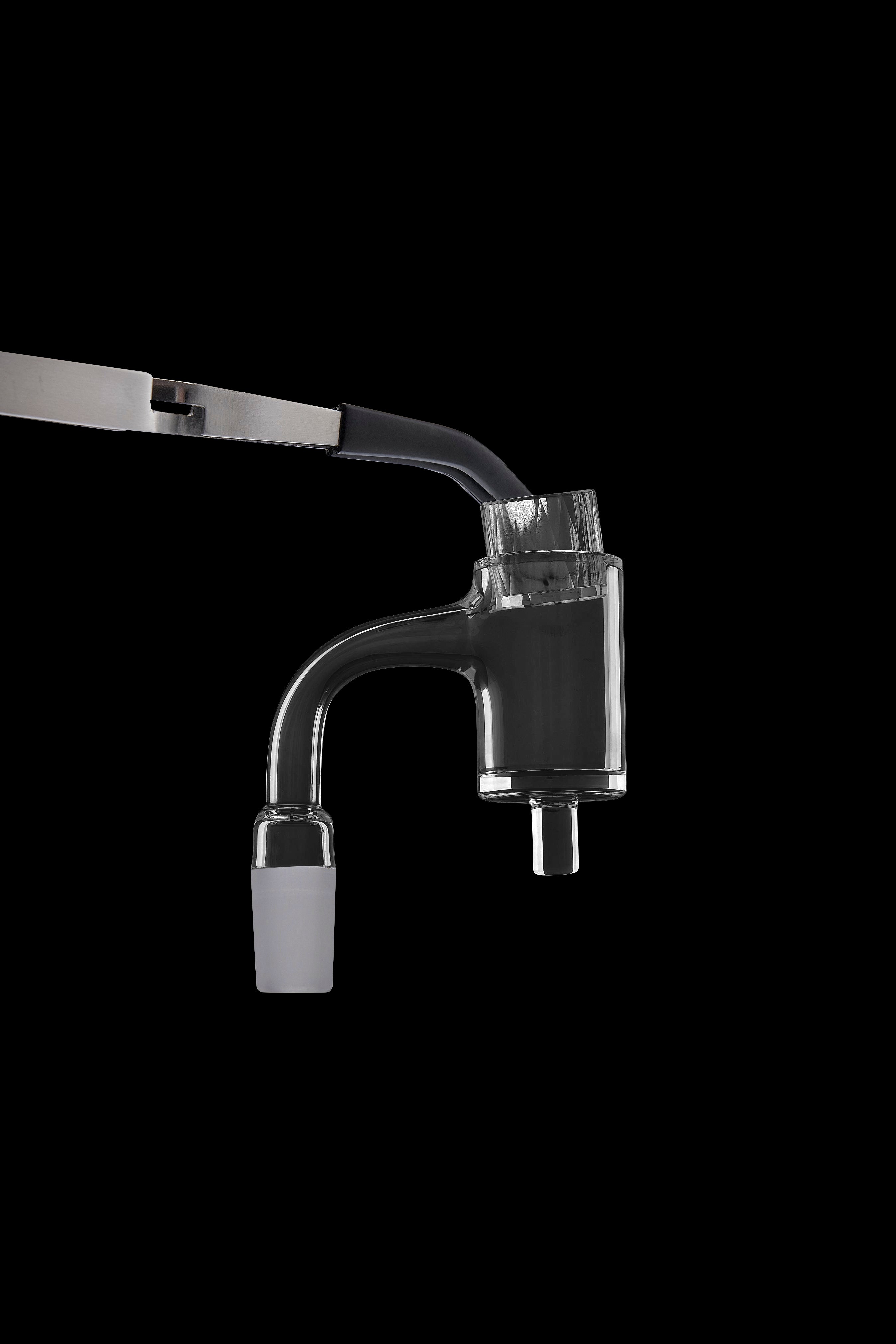 Clear glass dab rig attachment with angled neck and dual vapor path, isolated on a black background.