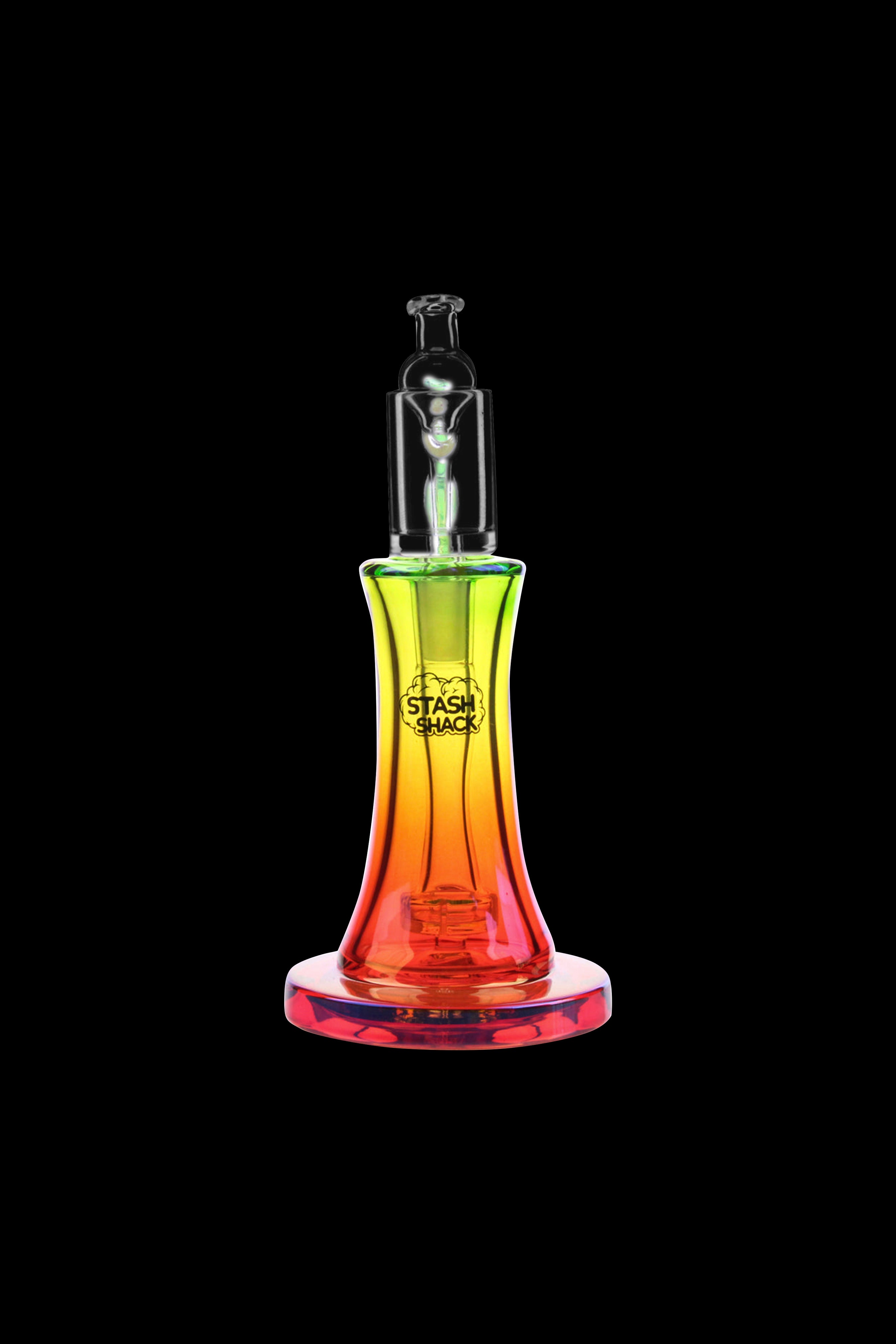 Colorful glass dab rig with “Stash Shack” logo against a black background.
