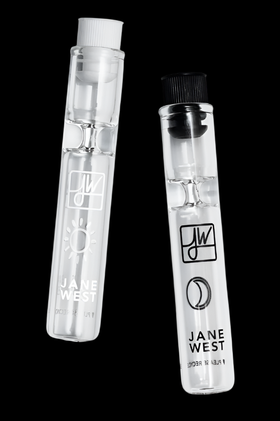 Clear, cylindrical cannabis oil vape cartridge with black mouthpiece, branded “Jane West” with minimalist logo.